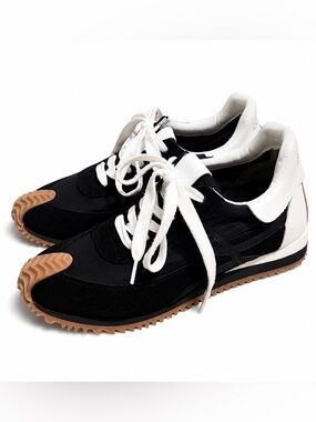 Women’s Black and White Retro Runner Sneakers with Gum sole.